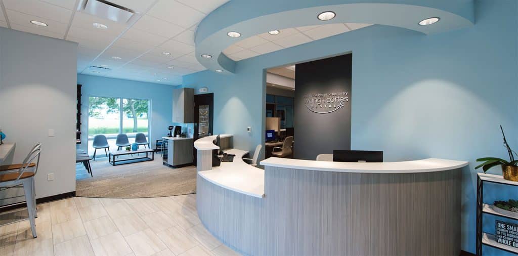The beautiful and welcoming dental office front desk at Wang + Cortes