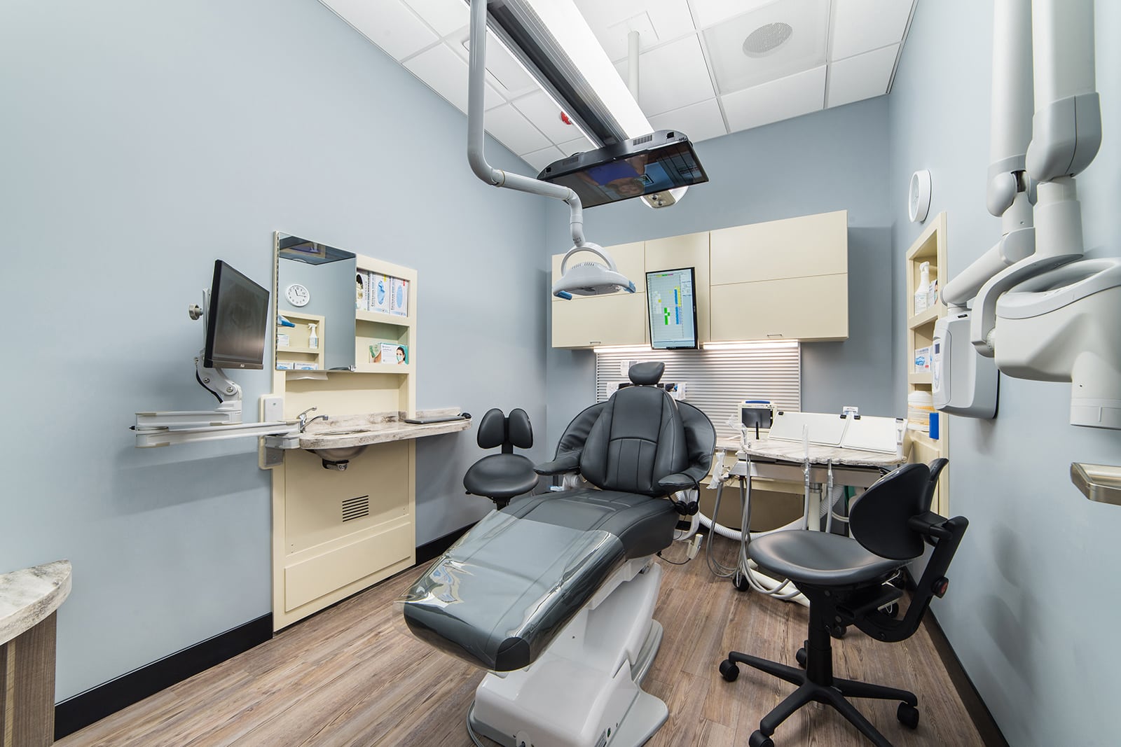 Dental office operatory with workstation and patient chair